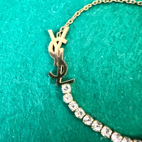 Yves Saint Laurent Jewelry - YSL Cassandra Bracelet Gold Tone & Crystals Charm Monogram Bracelet
